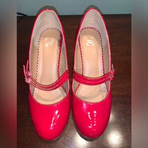 Ruby red patent Mary Jane style.  So fun for that pop of color